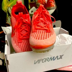 Nike Vapor max women’s shoe in orange or salmon